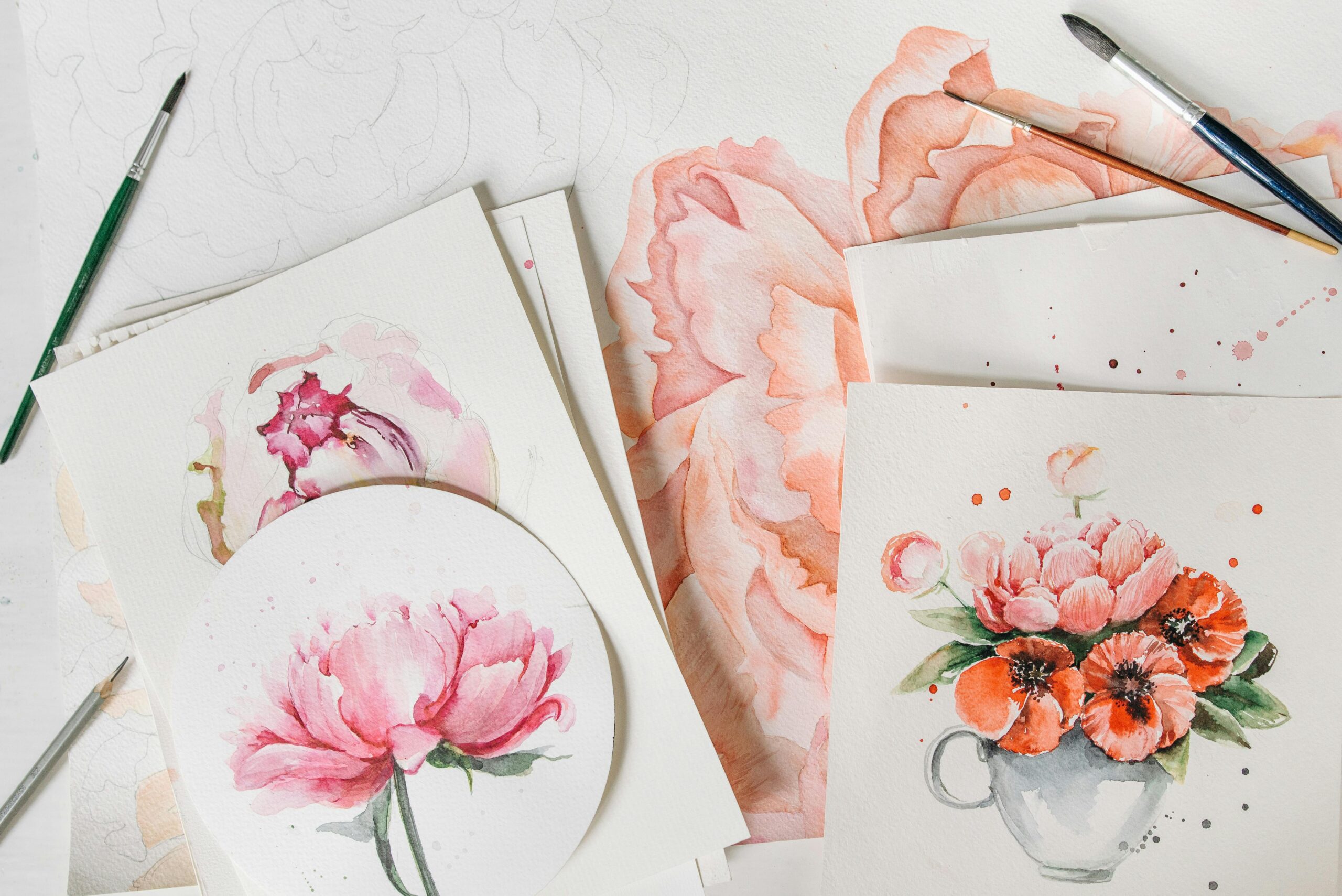 Creative watercolor flower paintings and sketches showcasing beautiful floral art on paper.