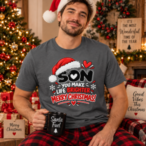 Man wearing a Son holiday T-shirt with bold “You Make Life Brighter” Christmas artwork in red, black and white.