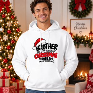 Man wearing a white Brother Christmas hoodie featuring “Still My Favorite Christmas Problem” with festive Santa hat artwork.
