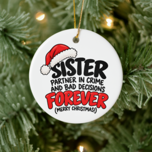 Round Sister Christmas ornament hanging on a tree featuring “Partner in Crime and Bad Decisions Forever” with festive Santa hat artwork.
